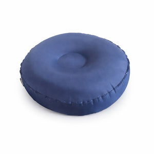 Un coussin de méditation gonflable ergonomique de forme ronde avec une assise légèrement creusée, conçu pour offrir confort et stabilité lors de la méditation.