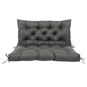Coussin extérieur imperméable épais confortable avec matelassage capitonné et liens de fixation sur les côtés, conçu pour habiller un banc ou une banquette de jardin.