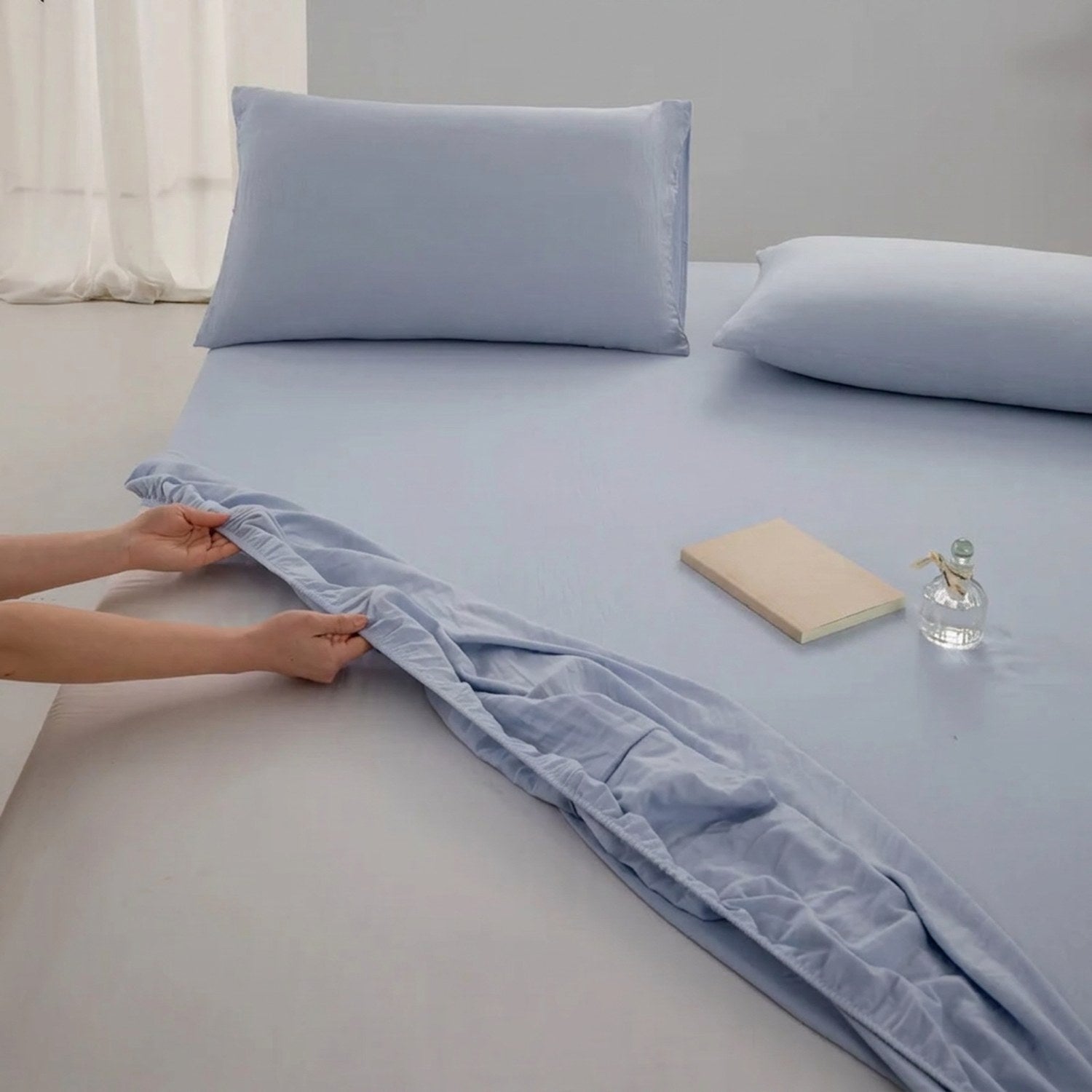 Drap-housse en coton couleur bleu