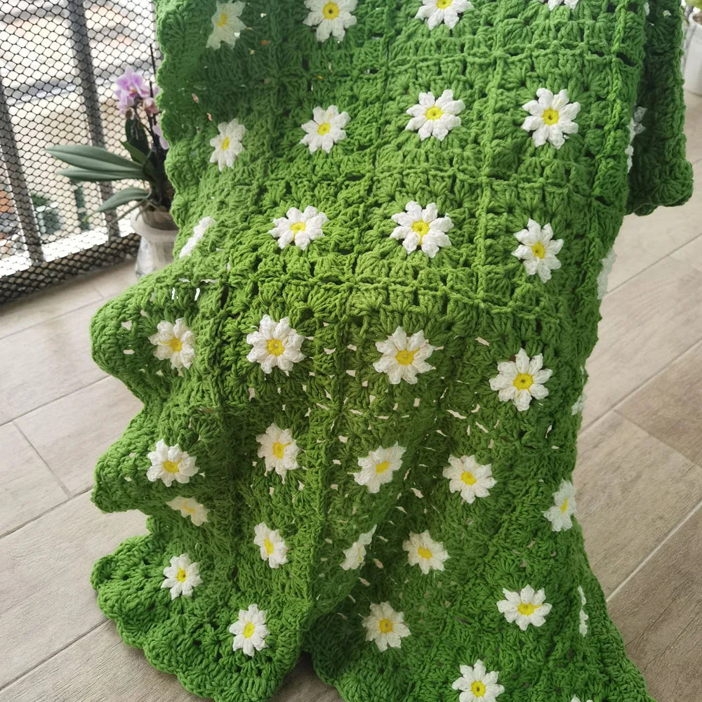Plaid crochet à motifs marguerites