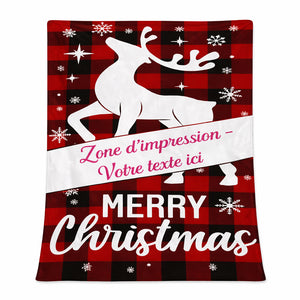 Un plaid personnalisé avec texte motif renne de noël, illustré d’un grand renne stylisé et d’une zone centrale permettant d’ajouter un message personnalisé, entouré d’éléments hivernaux et d’une inscription festive.