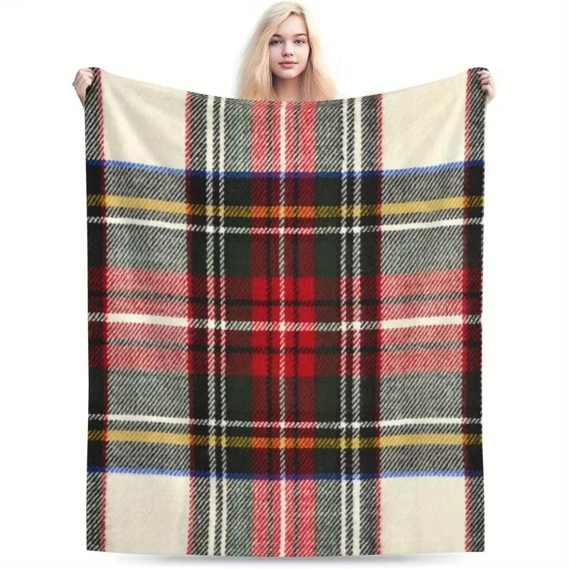 Un plaid tartan à motif écossais, avec un motif à carreaux. 