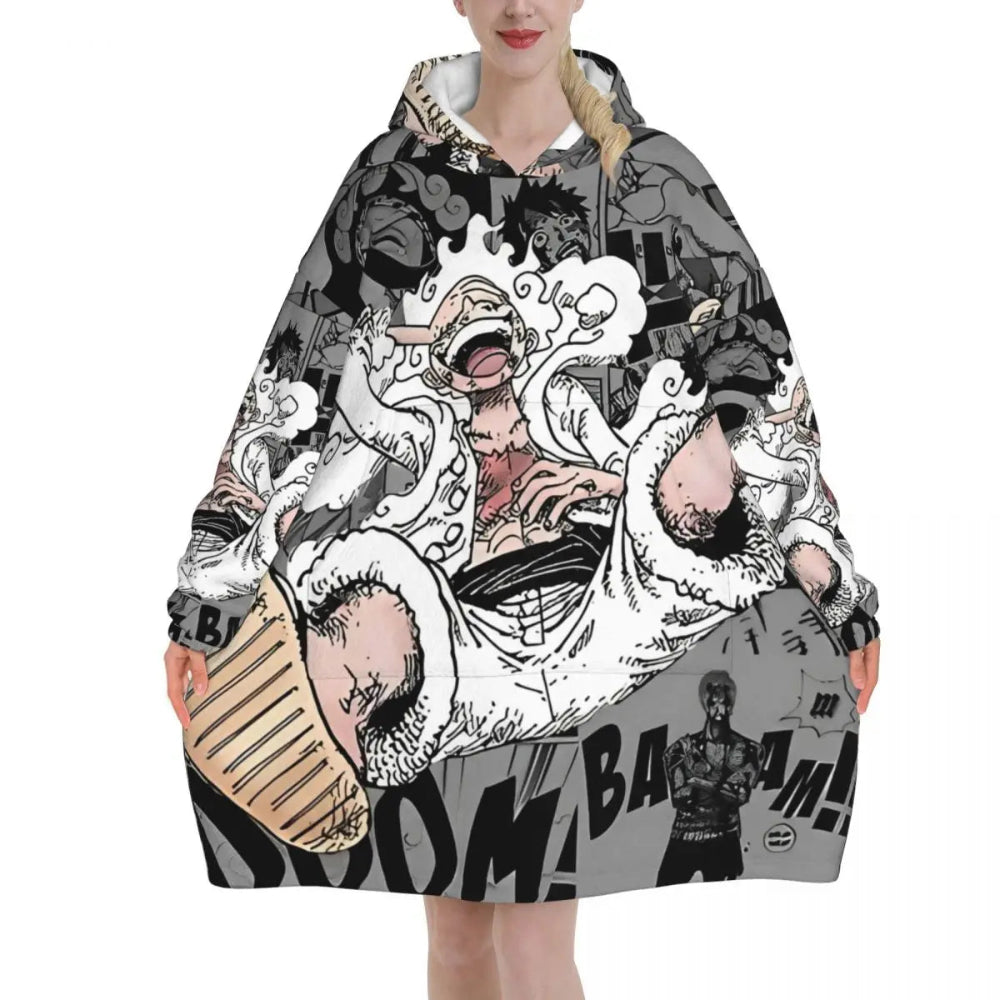 Un pull plaid Monkey D. Luffy oversize à capuche porté par une personne, avec un motif manga dynamique représentant Luffy en pleine action, offrant une allure enveloppante et expressive.