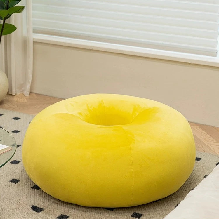 Pouf salon forme donut en velours doux style cocooning