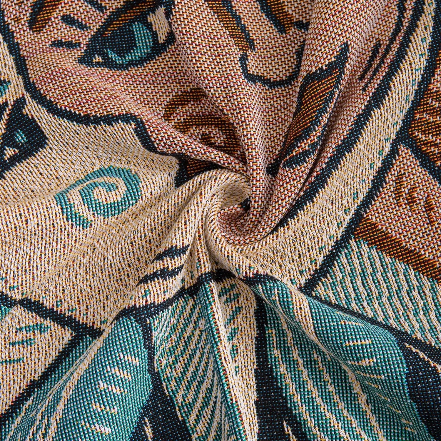 Détail du tissage de la tapisserie plaid soleil et lune