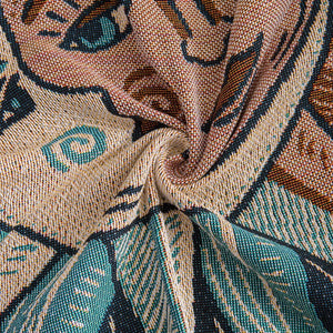 Détail du tissage de la tapisserie plaid soleil et lune