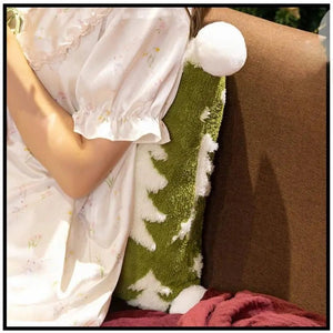 Coussin de Noël brodé motif sapin, ambiance feutrée autour du produit