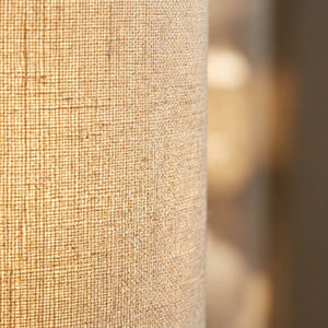 Texture gros plan du tissu lin naturel de l'abat-jour cylindrique beige