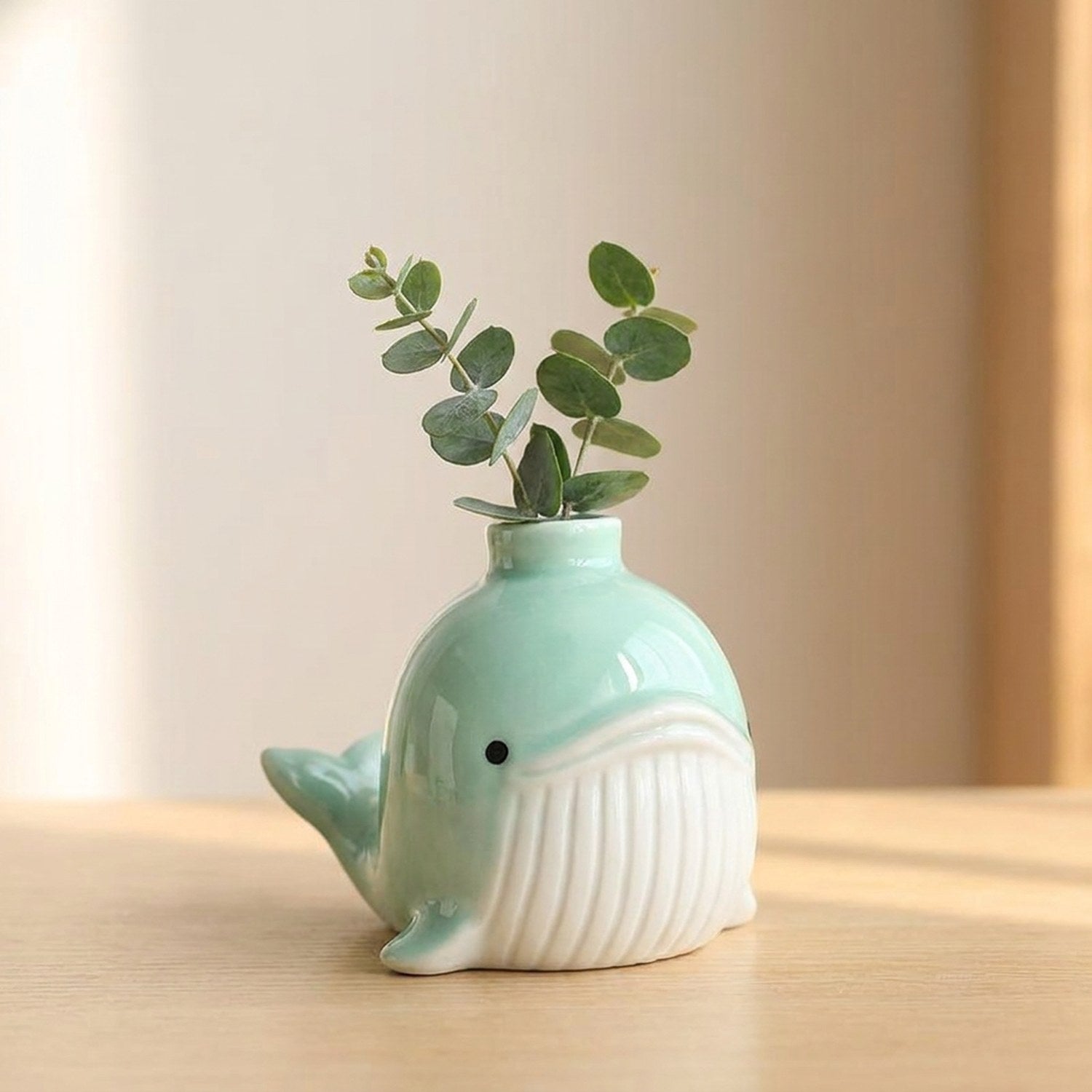 Vase baleine céramique vert menthe avec eucalyptus