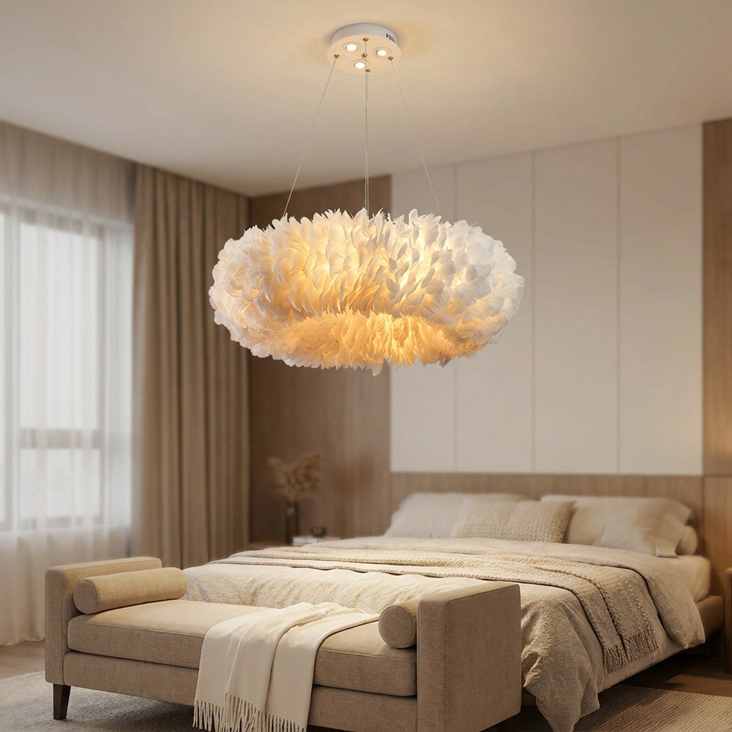 Lustre suspension en plumes blanches dans une chambre cocooning au-dessus d'un banc