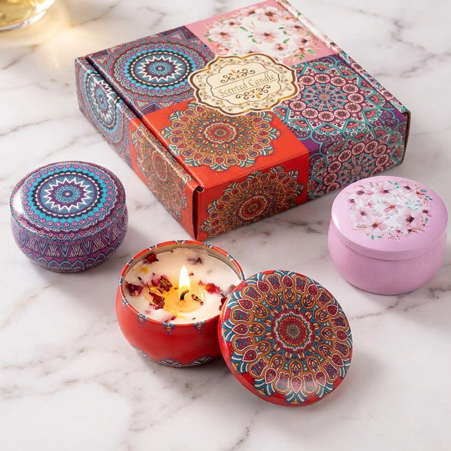 Coffret 4 bougies mandala soja fleurs séchées allumées sur marbre