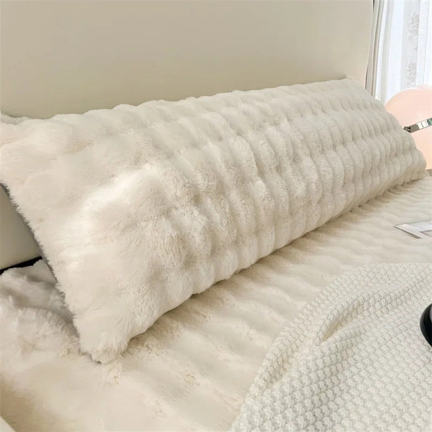 Traversin en peluche blanche photo produit vue d'ensemble