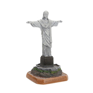 Statue du Christ rédempteur en résine vue légèrement de côté sur fond blanc