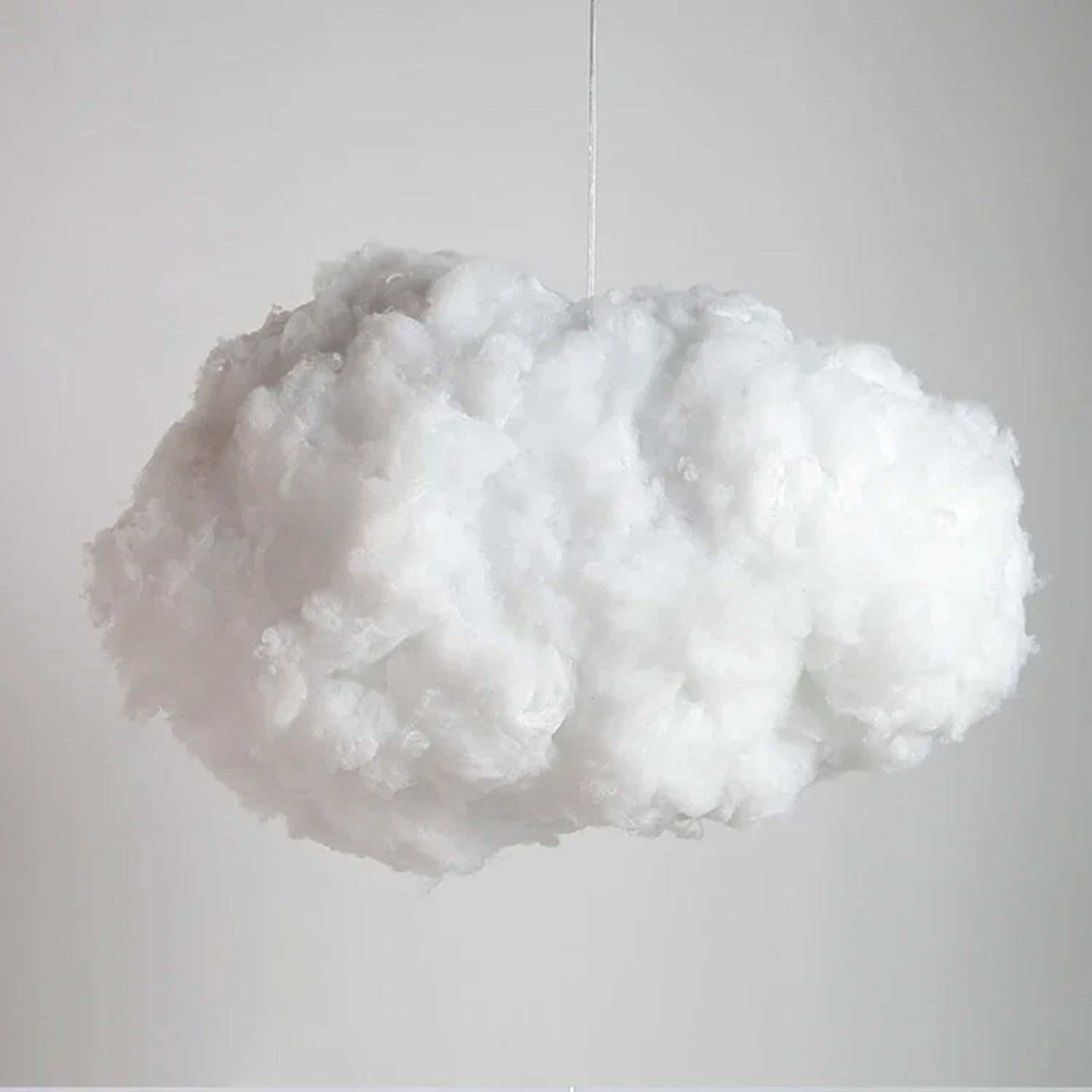 Détail texture suspension nuage LED blanche