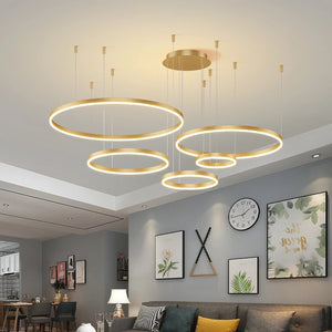 Lustre LED doré à anneaux circulaires concentriques, finition élégante