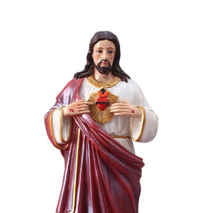 Détail du Sacré-Cœur de Jésus manteau bordeaux accents dorés gros plan