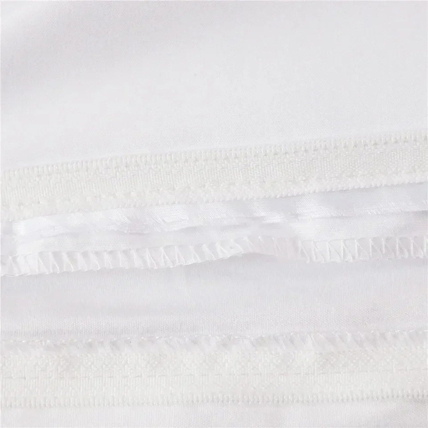 Détail des coutures de la parure de lit personnalisée