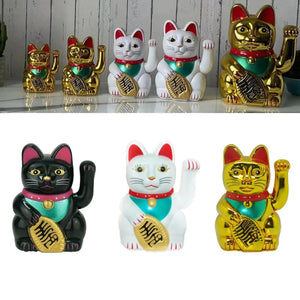 Comparatif des trois couleurs de chat porte-bonheur noir blanc et doré