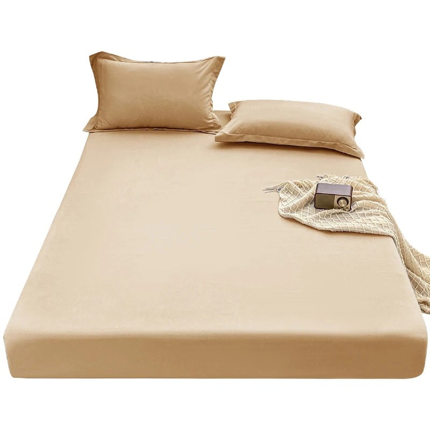 Détail du tissage satin beige du drap-housse