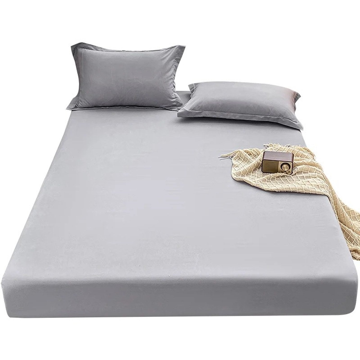 Détail du tissage satin blanc du drap-housse