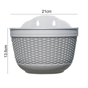 Dimensions pot mural imitation rotin : diamètre 21 cm, hauteur 13,5 cm