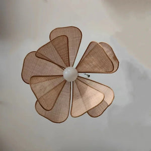 Vue de dessous suspension rotin pétale de lotus, maillage naturel