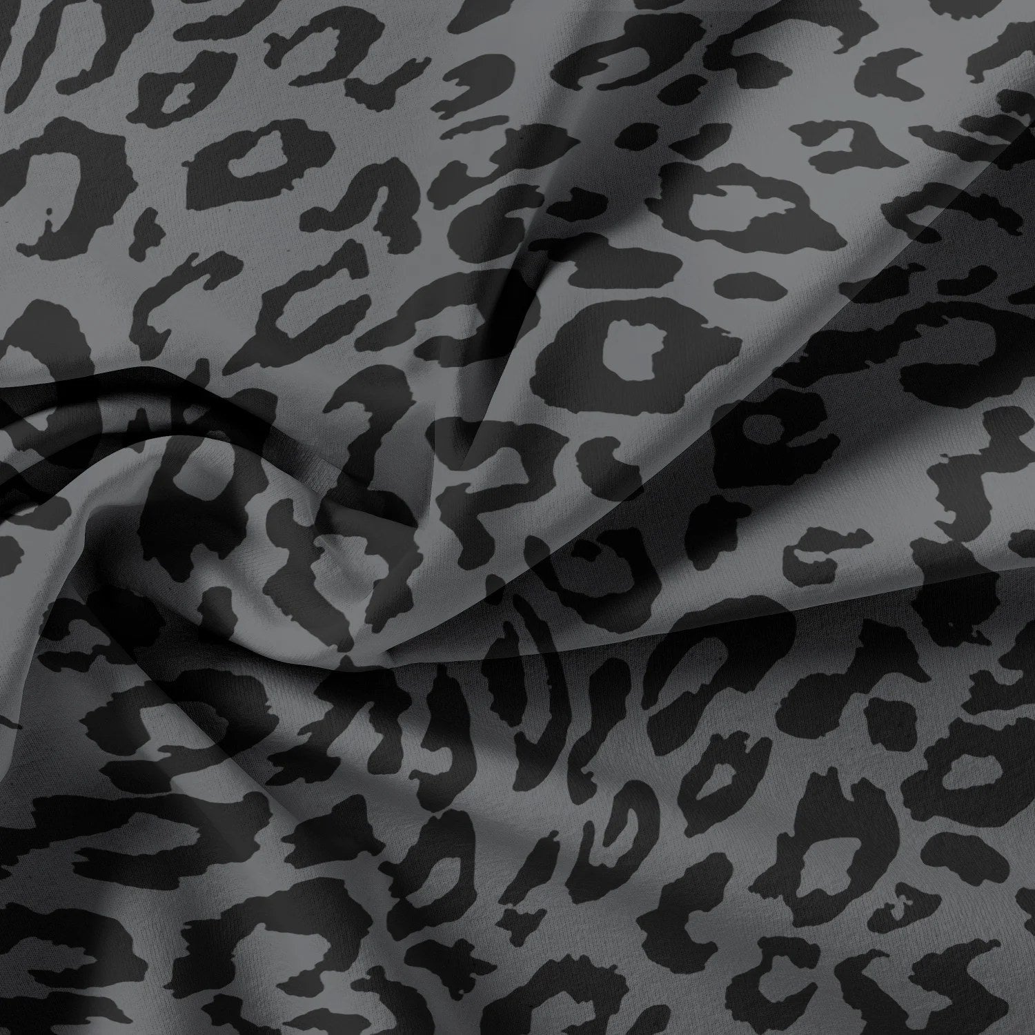 Détail du tissu léopard gris et noir de la housse de couette