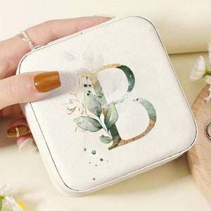 Détail du motif floral sur la boîte à bijoux de voyage initiale