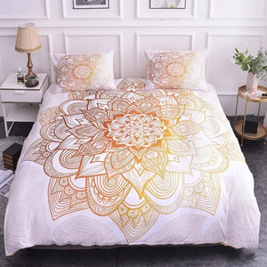 Parure de lit mandala dégradé doré posée sur un lit vue complète