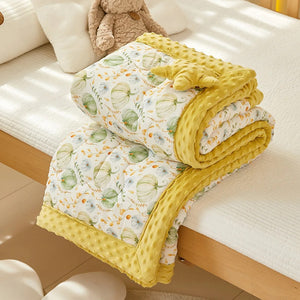 Couette bébé motif citrouilles pliée avec étoile en tissu moelleux