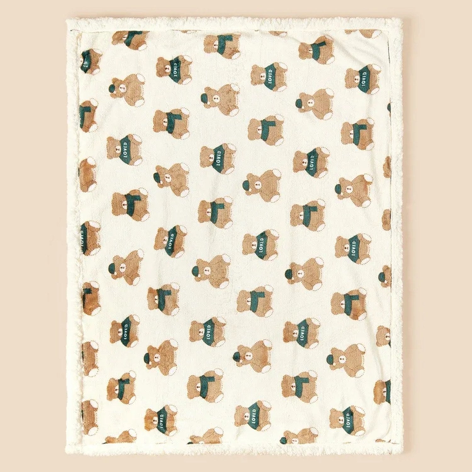 Couverture bébé motif ours au col vert vue à plat