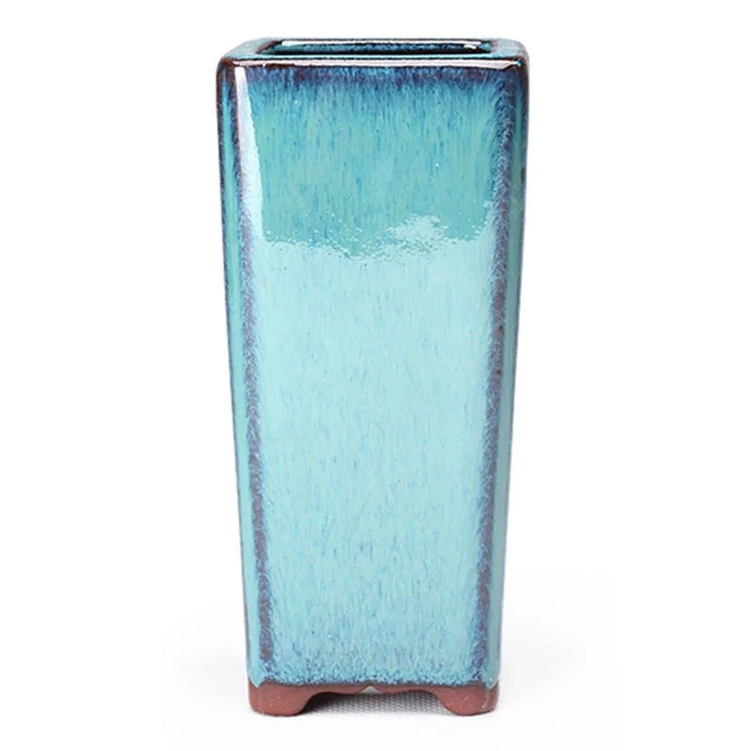 Pot de fleurs carré en céramique turquoise vu de face sur fond clair