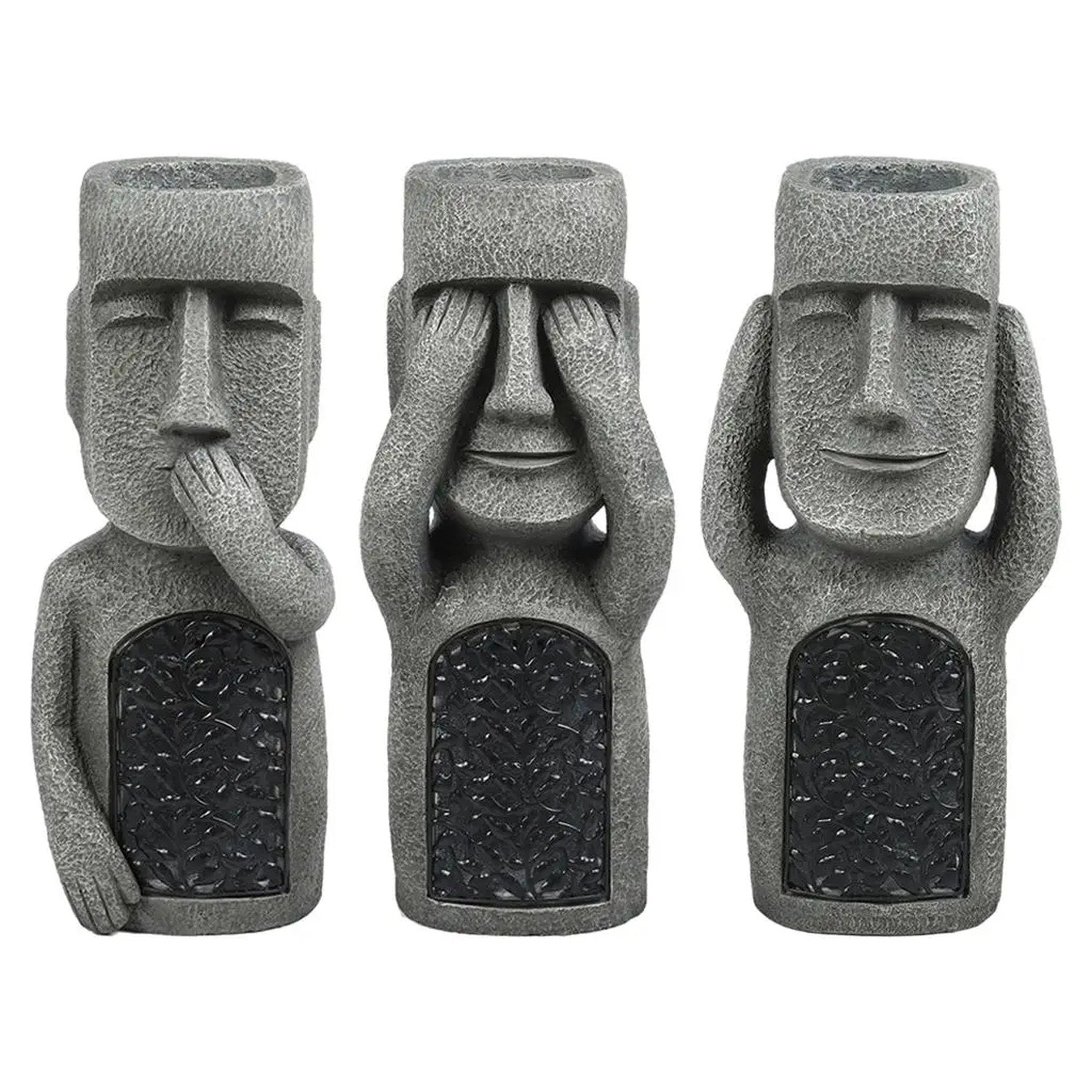 Trois modèles de statue Moai île de Pâques yeux oreilles et bouche couverts