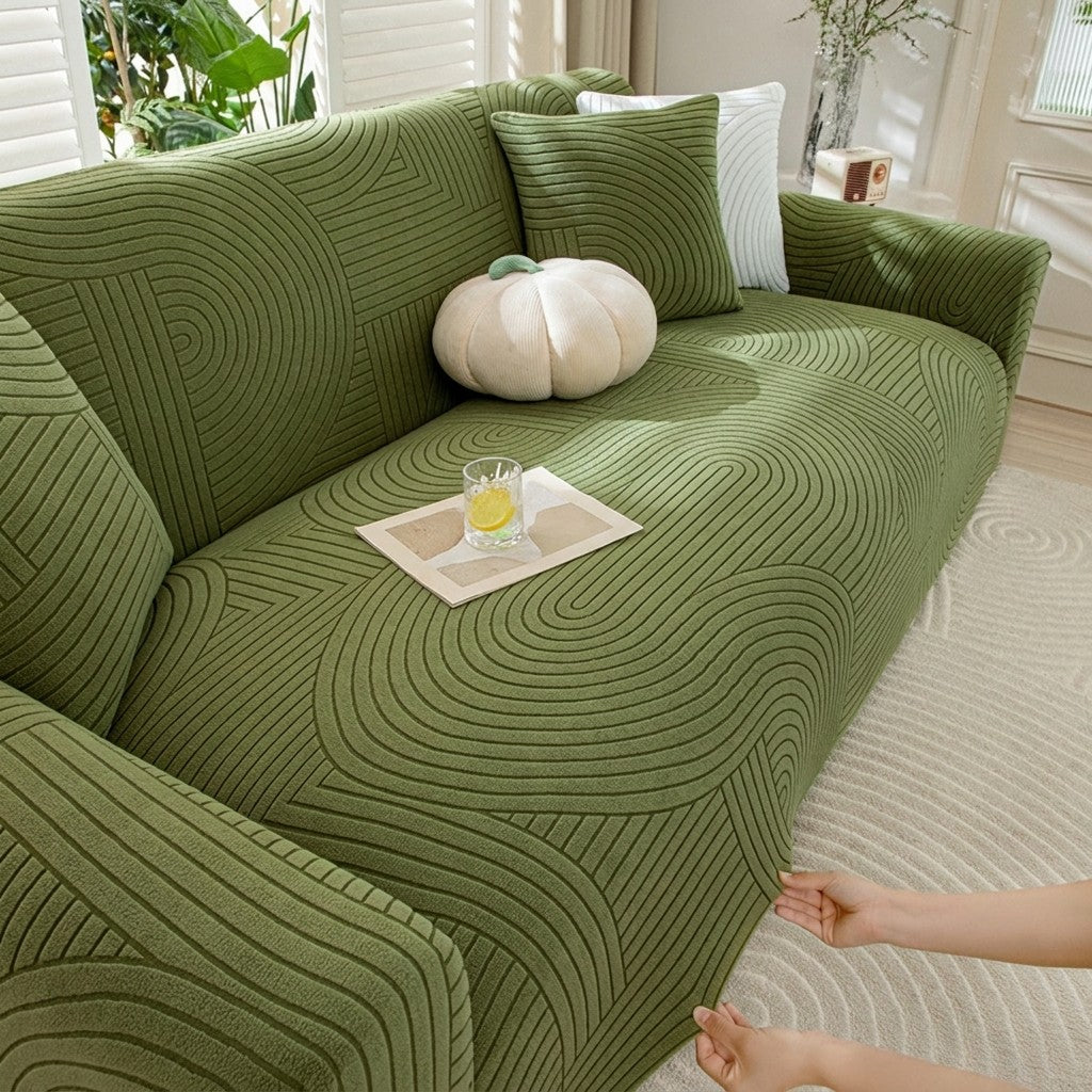 Housse velours vert foncé ajustée sur canapé