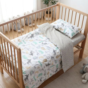 Parure de lit bébé motif Animaux dans un berceau