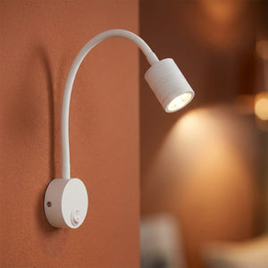 Applique murale blanche au bras flexible montée au mur