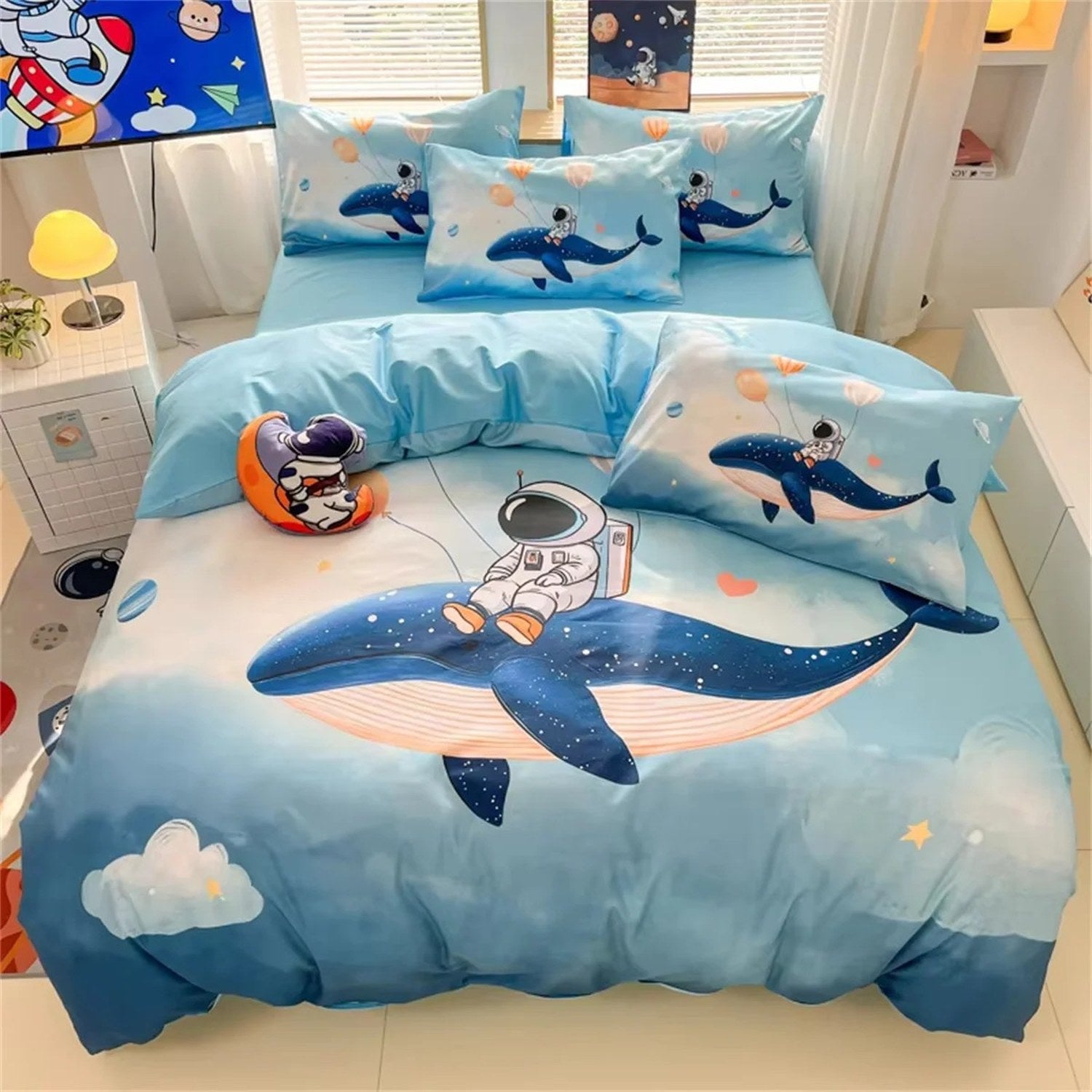 Photo du motif astronaute et baleine de la parure de lit enfant