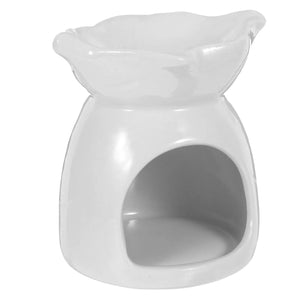 Brûle-parfum céramique blanc vu de profil sur fond neutre