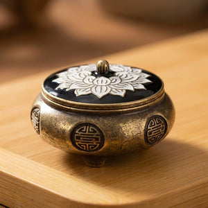 Brûleur d'encens bouddhiste modèle Trépied émail noir couvercle lotus blanc