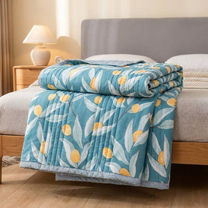 Couette d'été matelassée modèle feuillage bleu