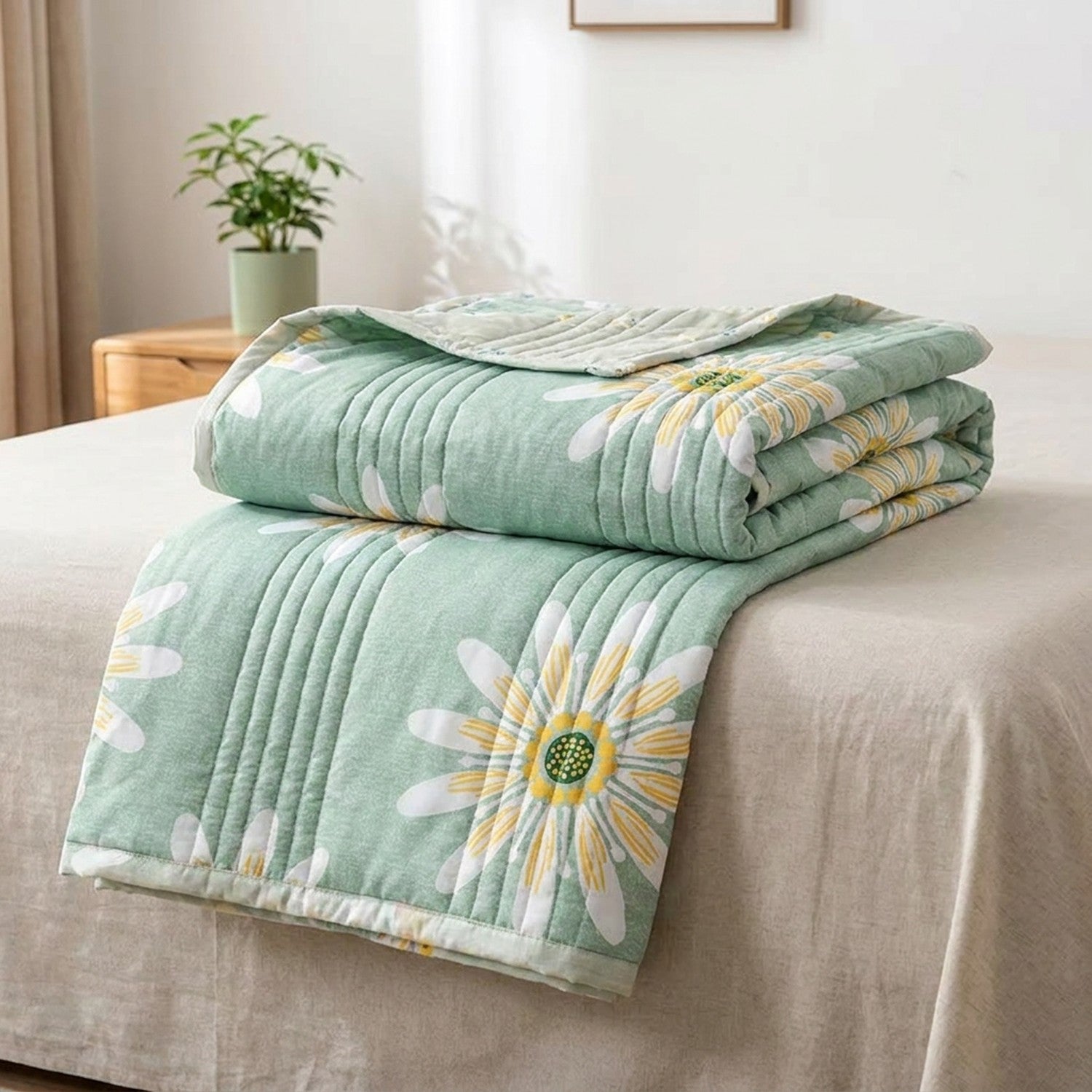 Couette d'été matelassée imprimée drapée au coin d'un lit