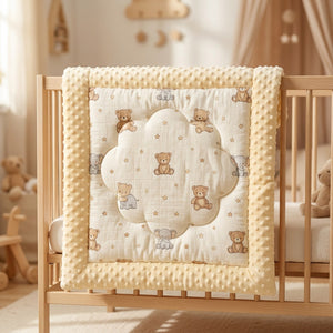 Couette bébé motif oursons avec bordure jaune à pois dans un berceau