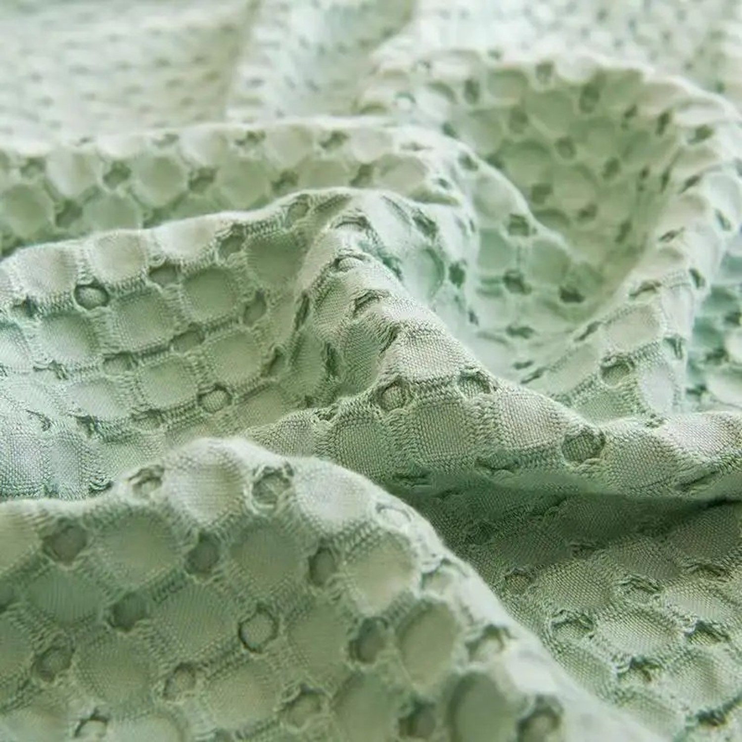 Gros plan sur le tissage nid d'abeille de la couverture en fibre de bambou