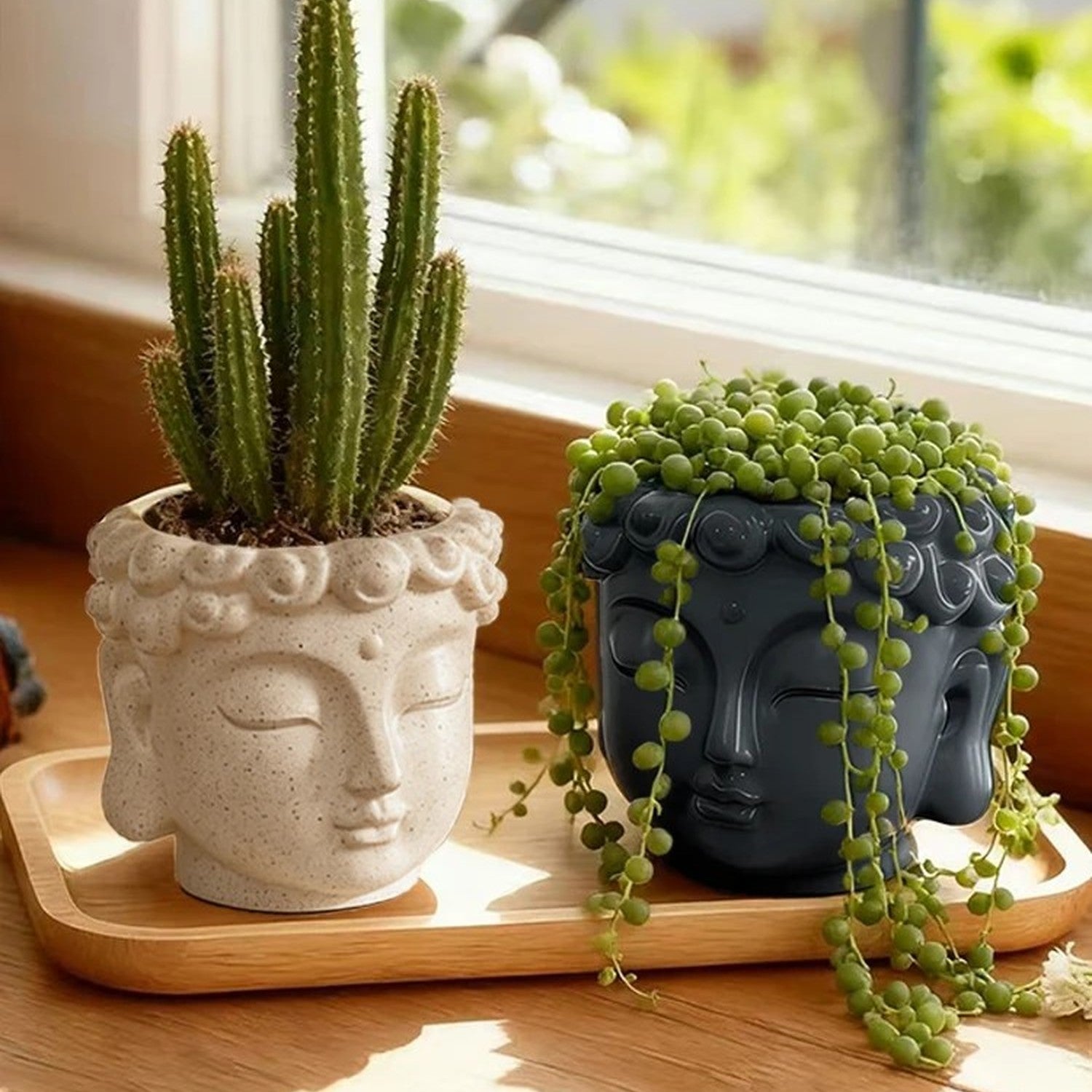 Tableau de présentation du pot de fleurs tête de bouddha en résine