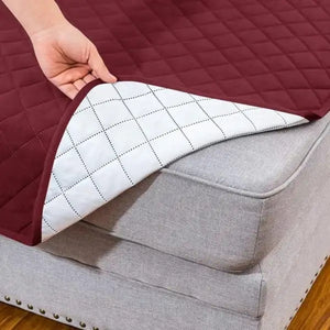 Détail de la housse réversible montrant l'envers clair du tissu matelassé
