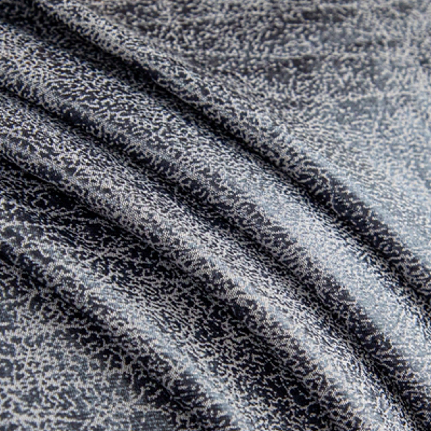 Détail de la texture jacquard extensible pour canapé
