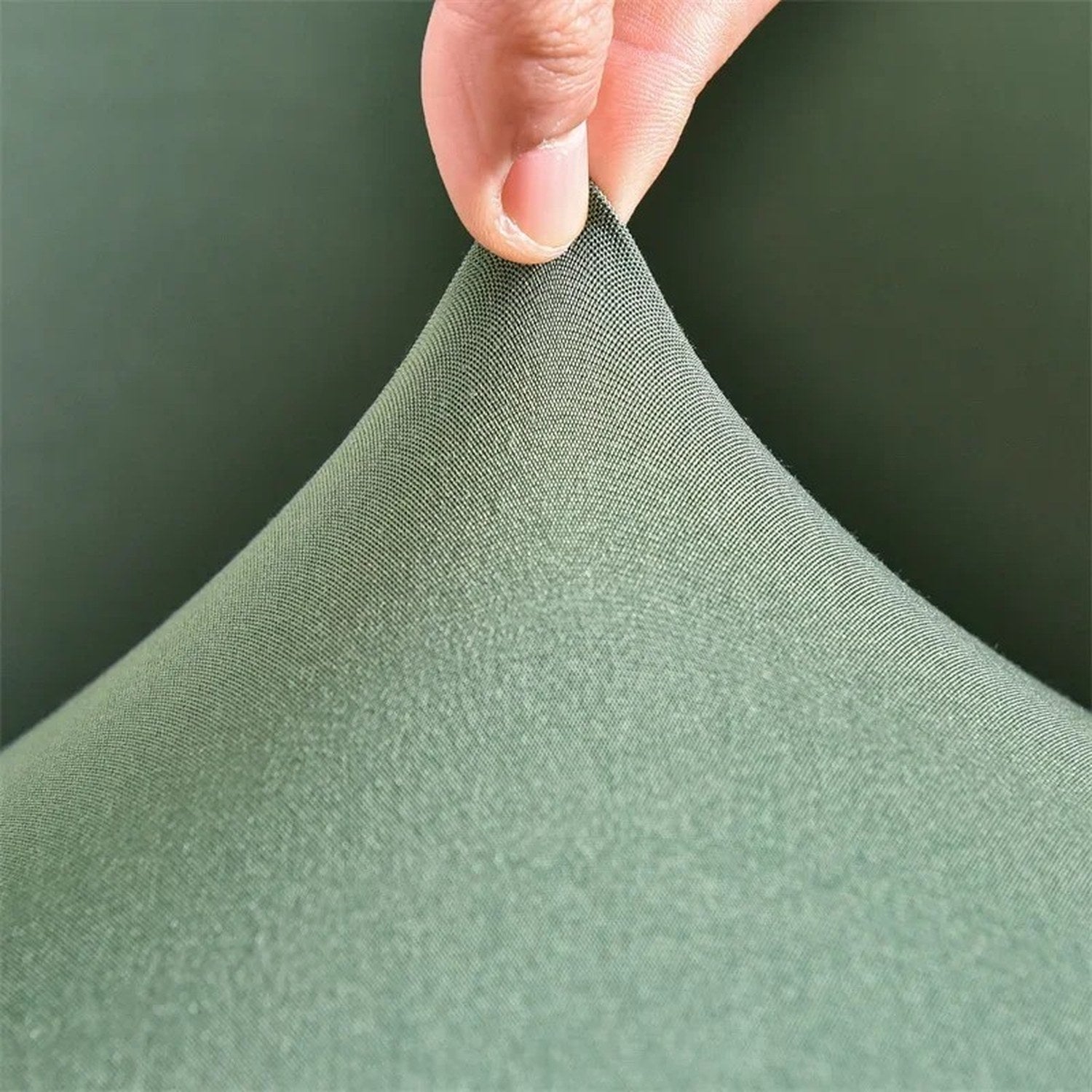 Détail du tissu extensible doux de la housse de fauteuil