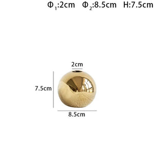 Dimensions du vase boule doré taille S : 7,5 cm de hauteur et 8,5 cm de diamètre