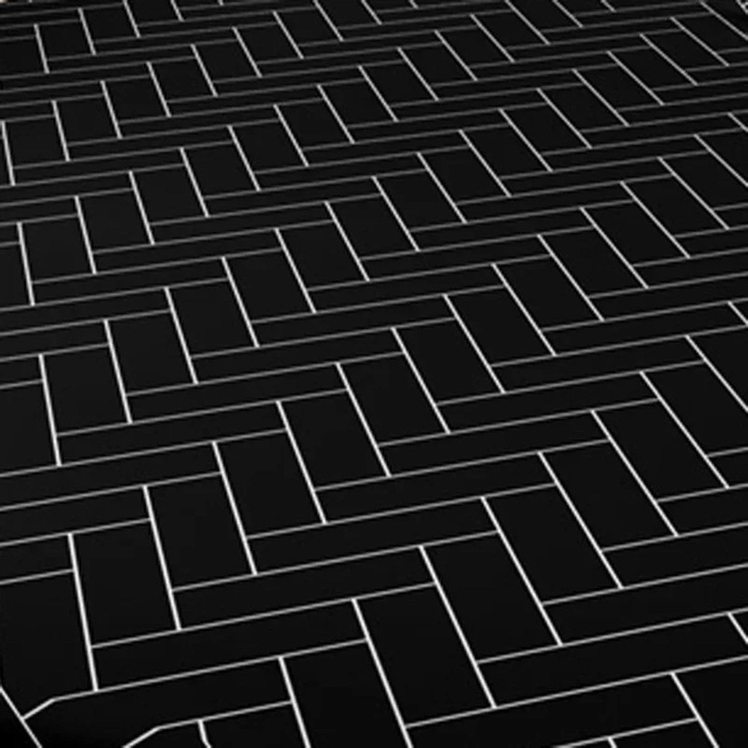 Détail du tissu et des lignes blanches du motif chevrons noir