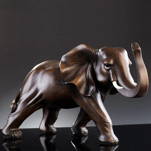 Sculpture d'éléphant en résine imitation bois vue 1